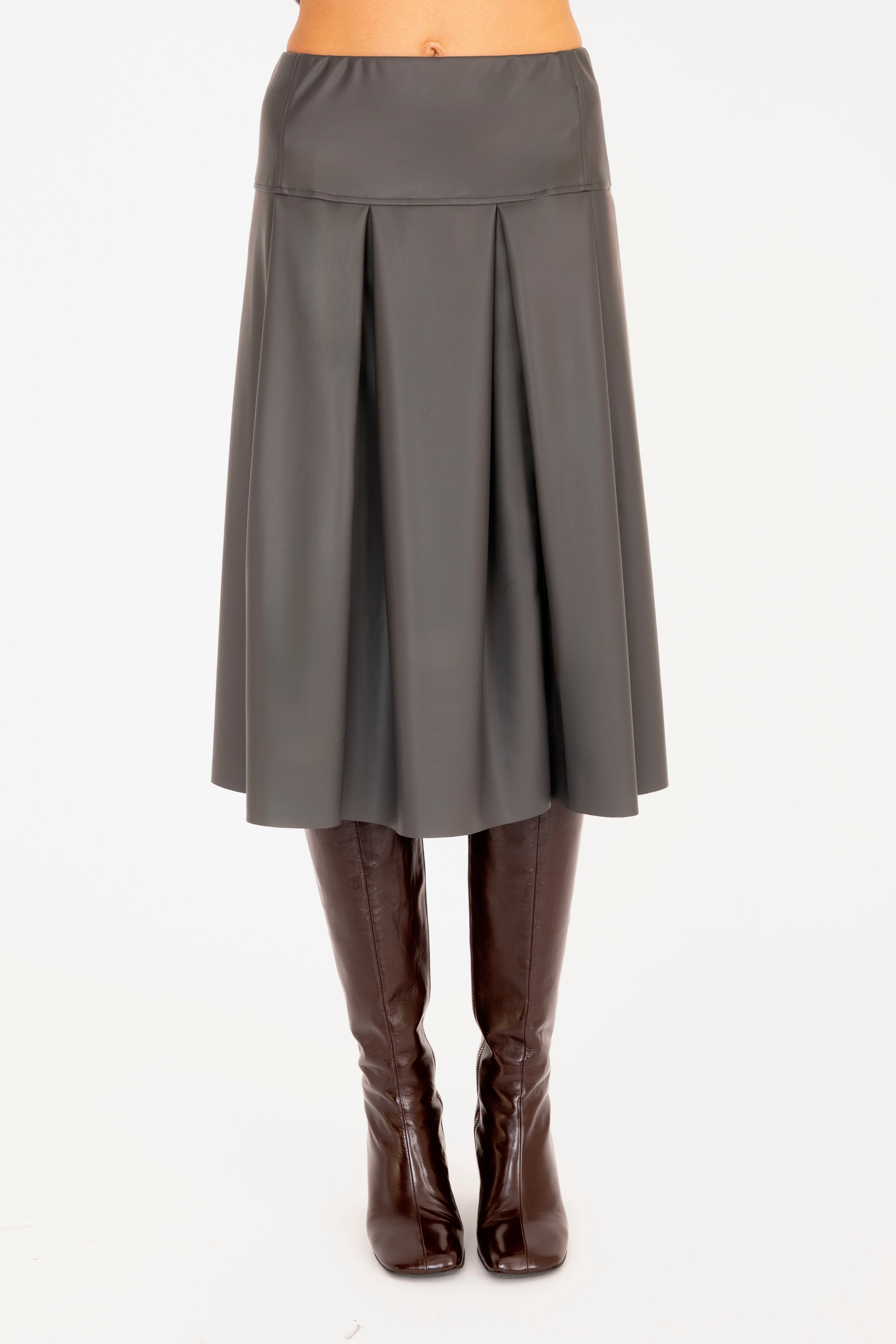 Gray skirt worn by a person on a white background