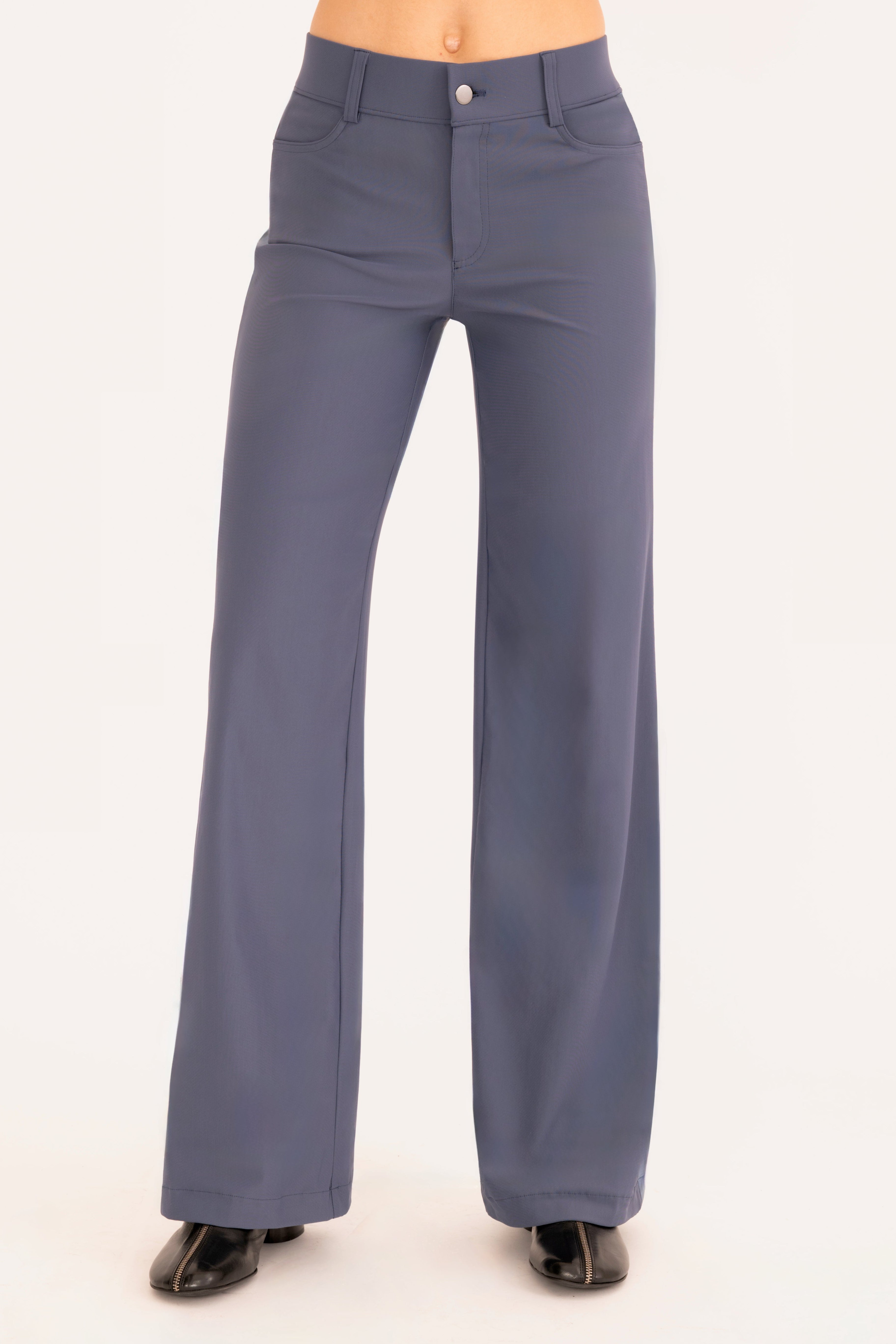 Front view of blue wide leg jean pants on a white background