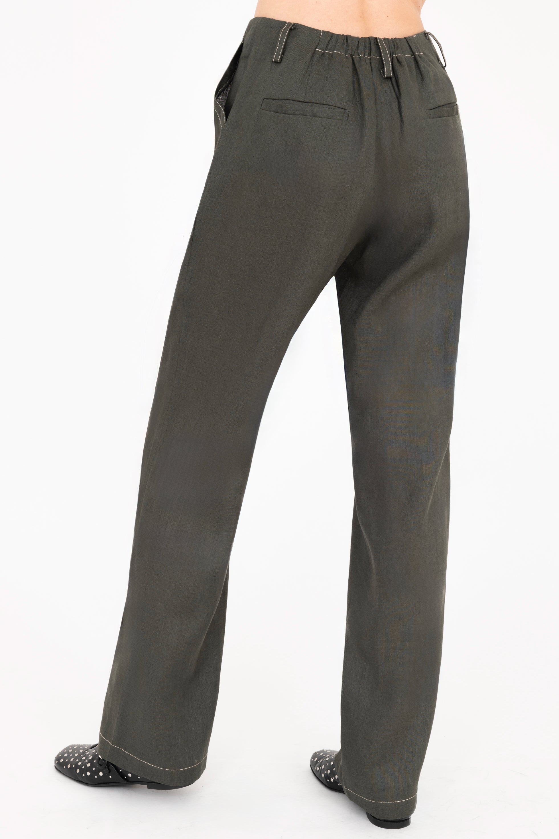 Pine green pants on a white background