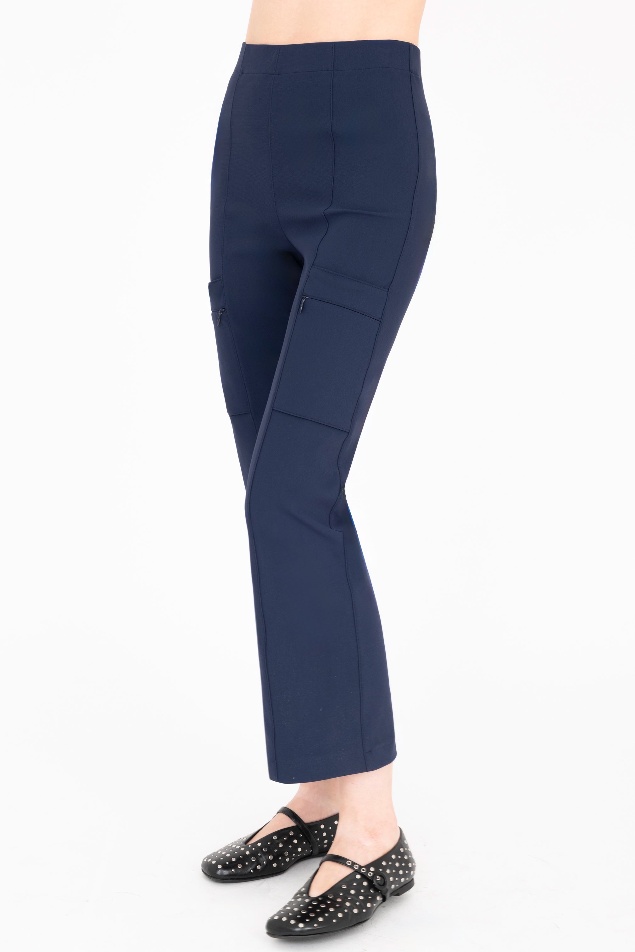 Quarter view of indigo blue cargo pants on a white background