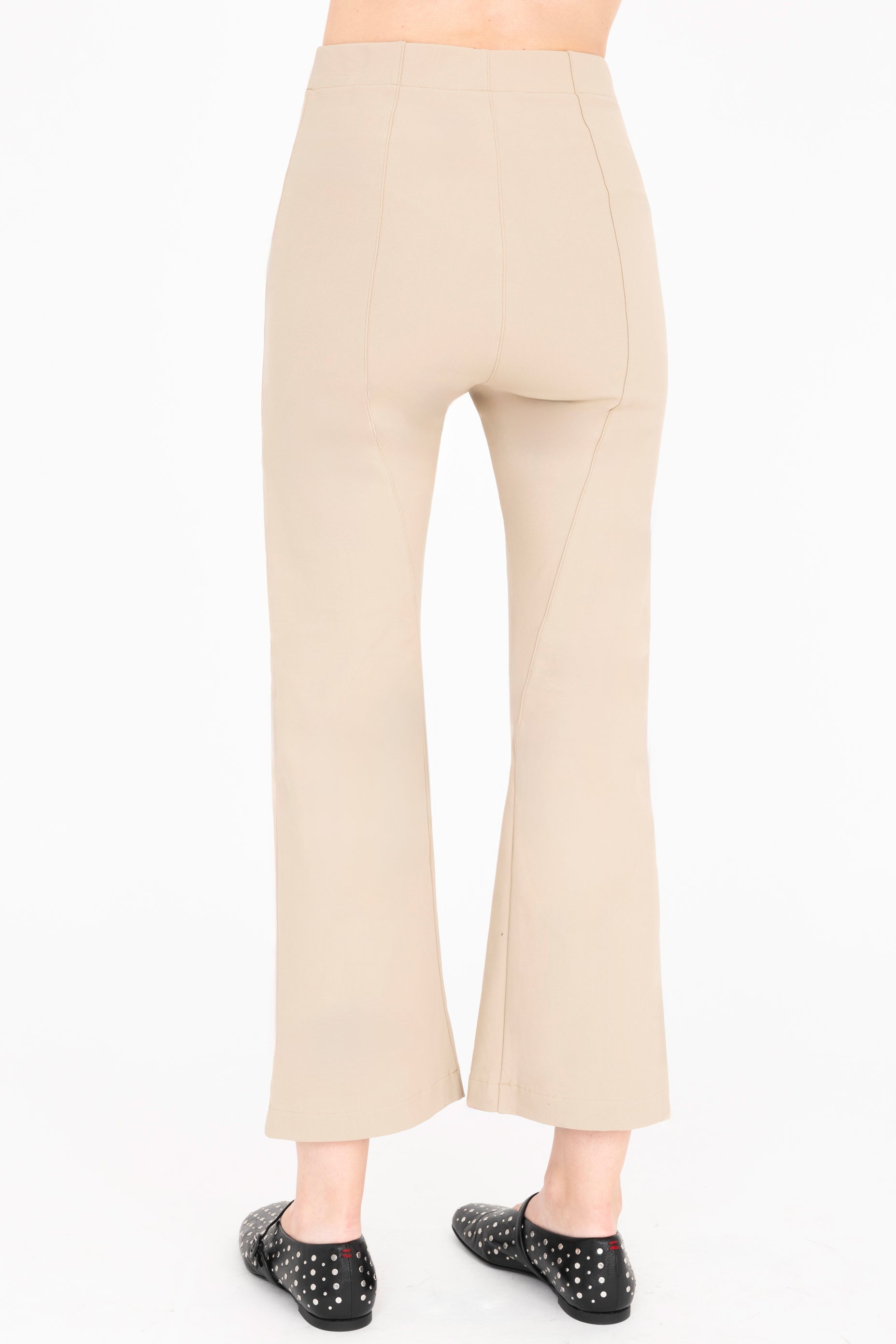 Back view of khaki cargo pants on a white background
