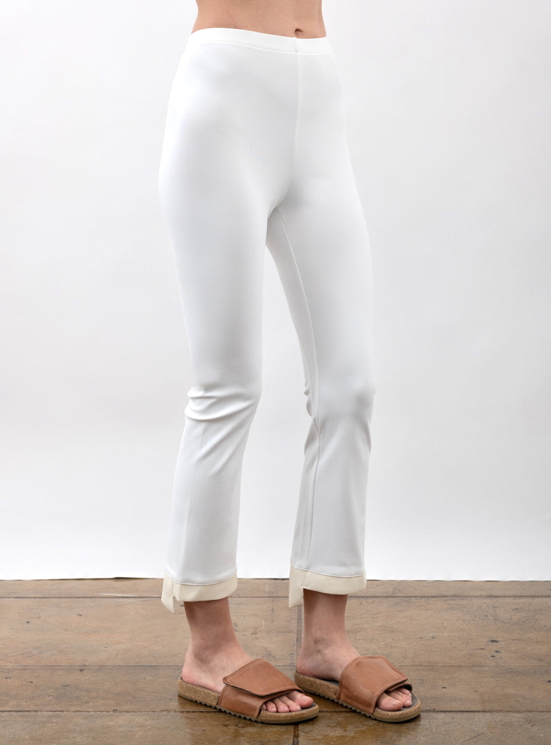 White Tech Stretch Vegan Leather Step Hem Cropped Flare Pant