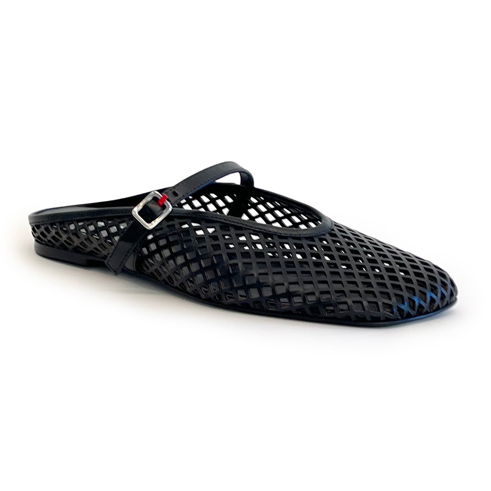 Black laser cut leather strap slip on flat shoe on a white background
