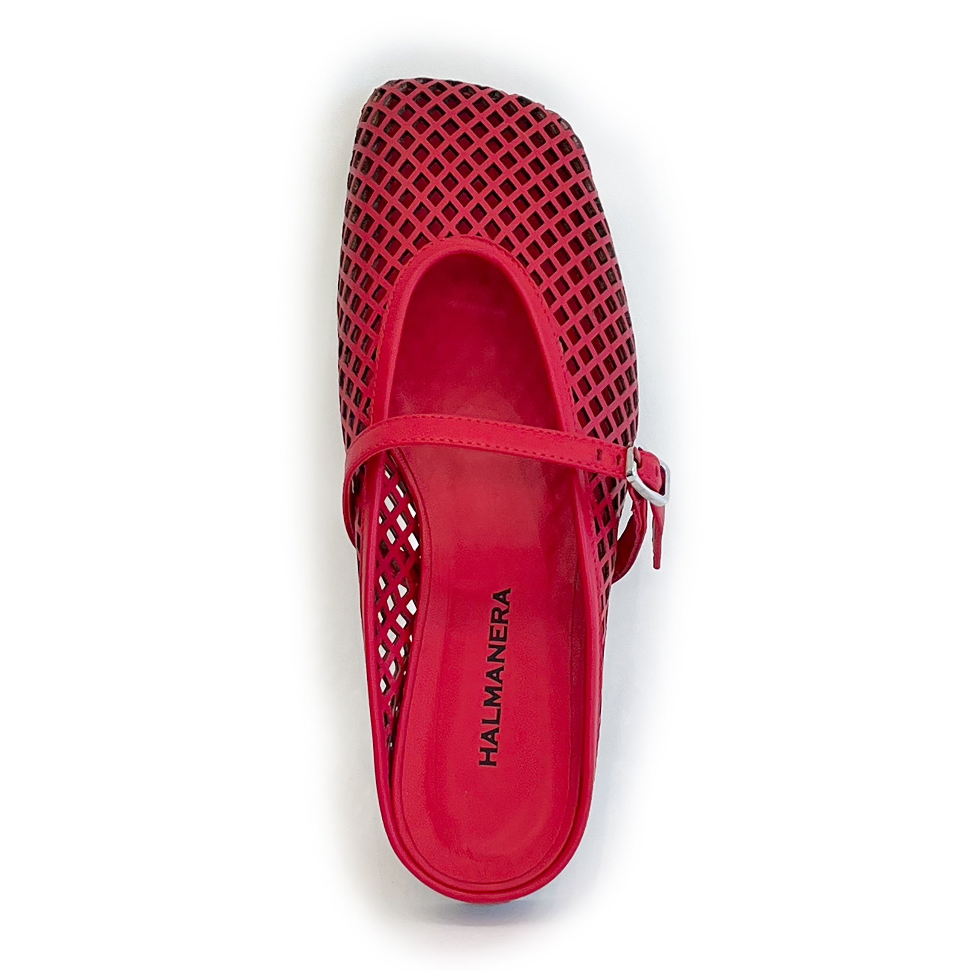 Red laser cut leather strap slip on flat shoe on a white background