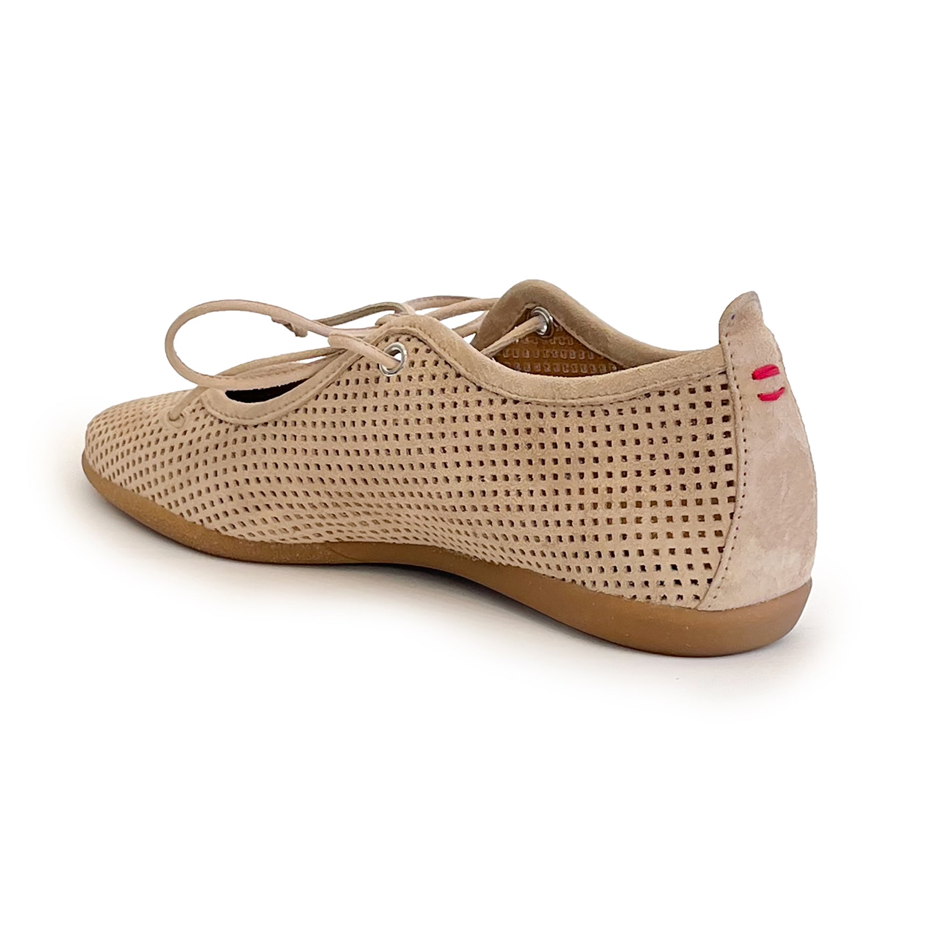 Beige perforated suede ballet flat shoe on a white background