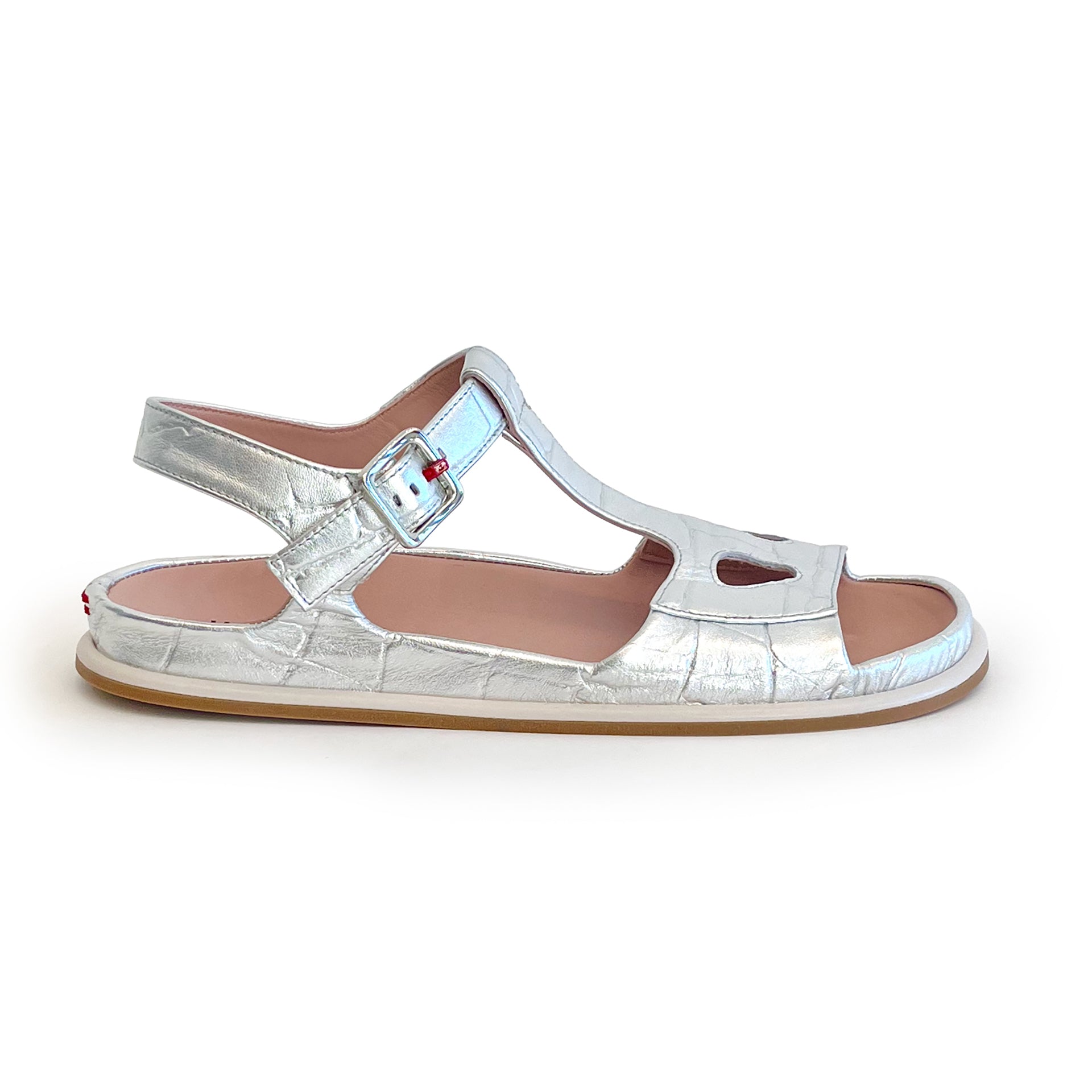 Silver croco ankle strap flat sandal on a white background
