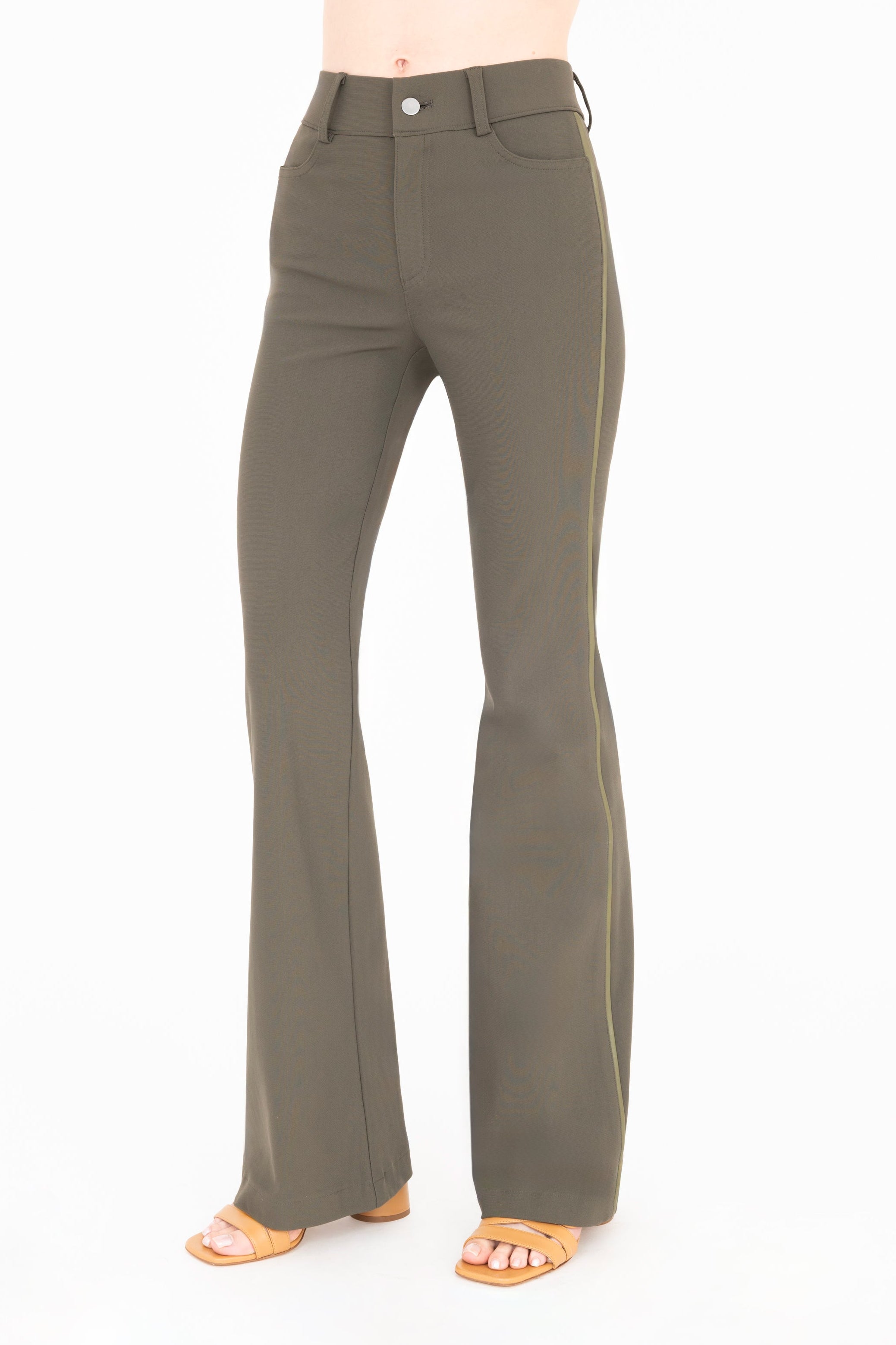 Side view of olive flare jean pants on a white background