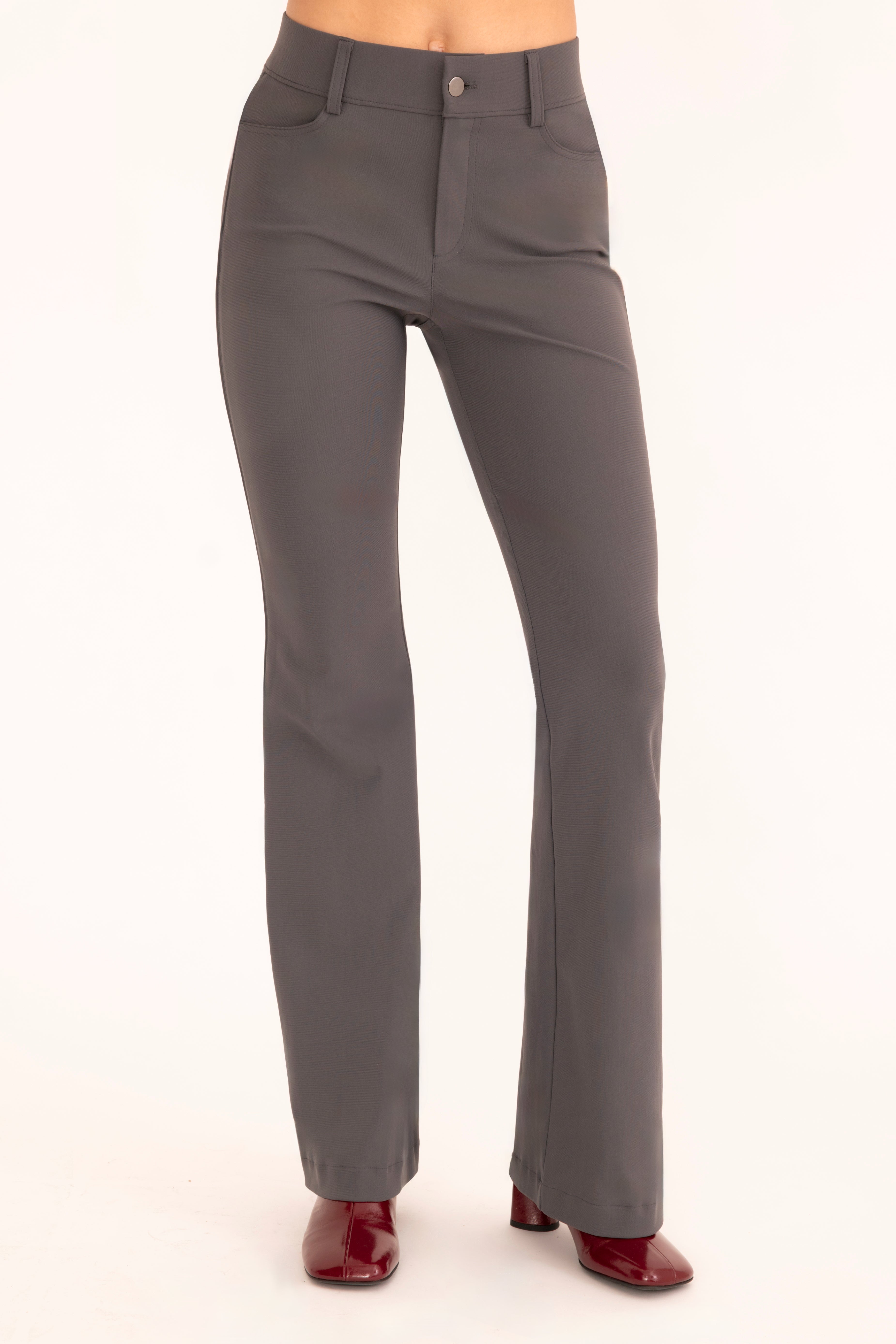 Front view of gray flare jean pants on a white background