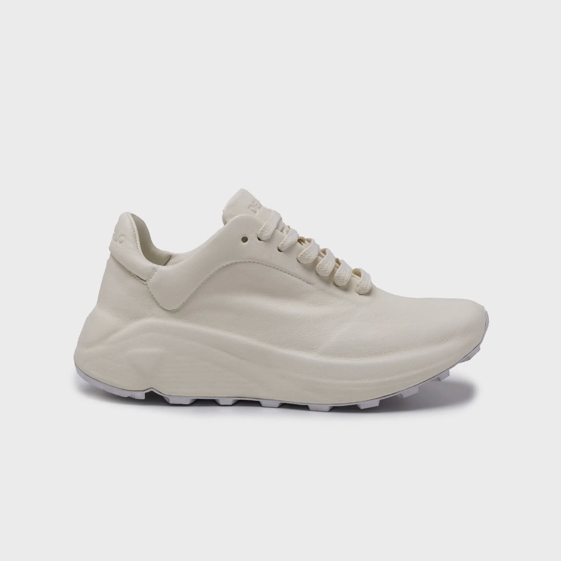 White sneaker on a light gray background