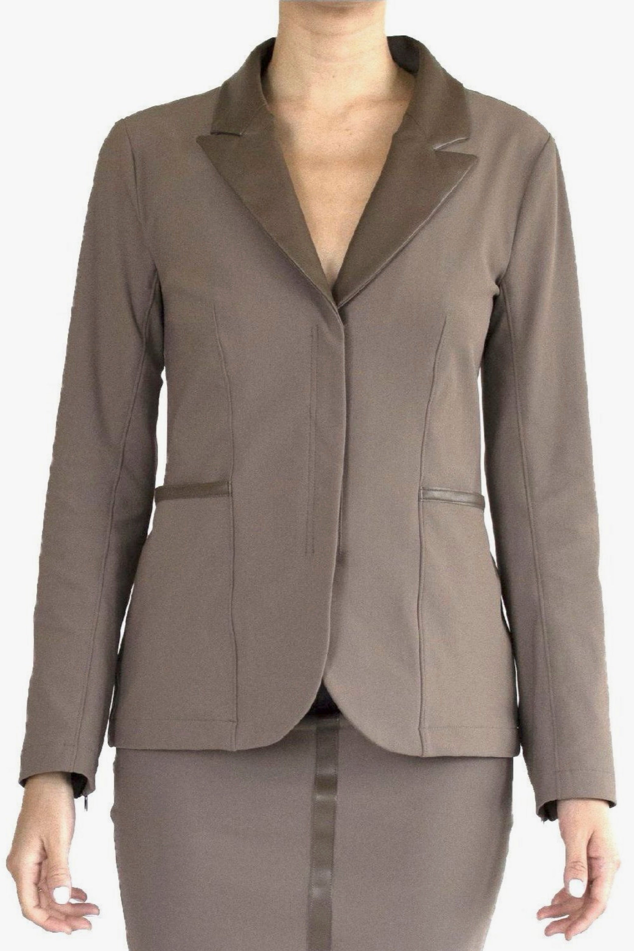 Brown suit jacket and skirt against a white background