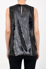 Black sequin sleeveless top worn by a model on a white background