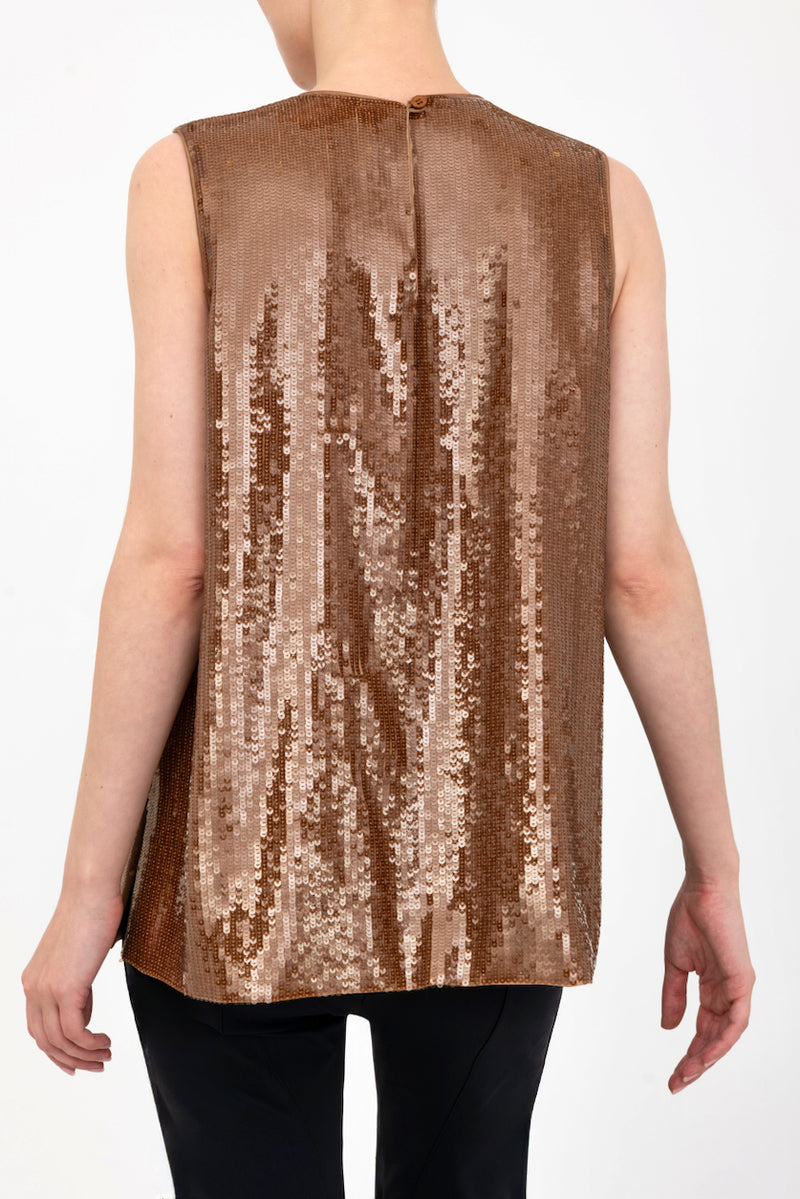 Bronze sequin sleeveless top worn by a model on a white background