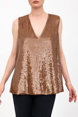 Bronze sequin sleeveless top worn by a model on a white background