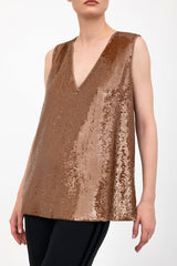 Bronze sequin sleeveless top worn by a model on a white background