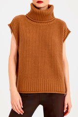 Brown knitted sleeveless sweater worn by a person on a white background