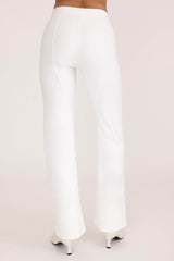 White pants on a plain background