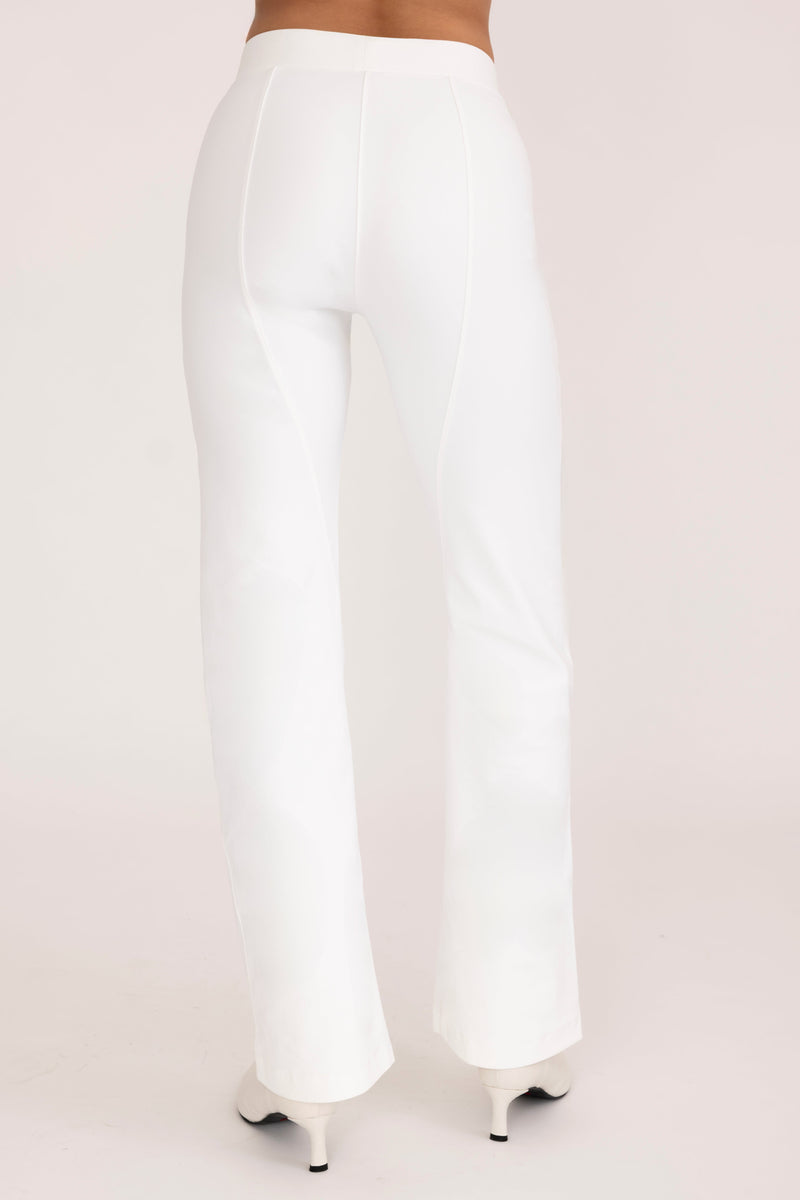 White pants on a plain background