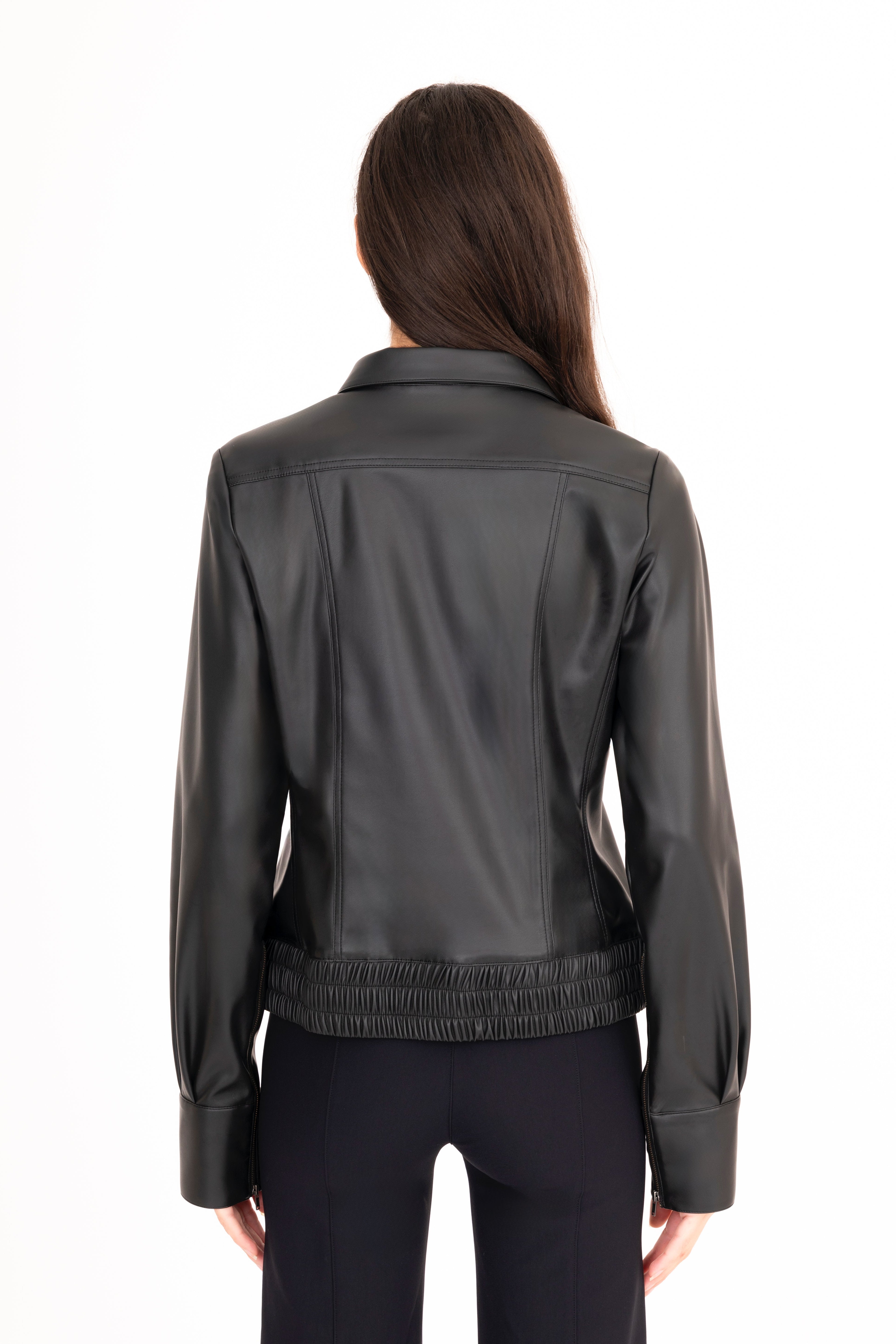 Person wearing a black leather jacket on a white background