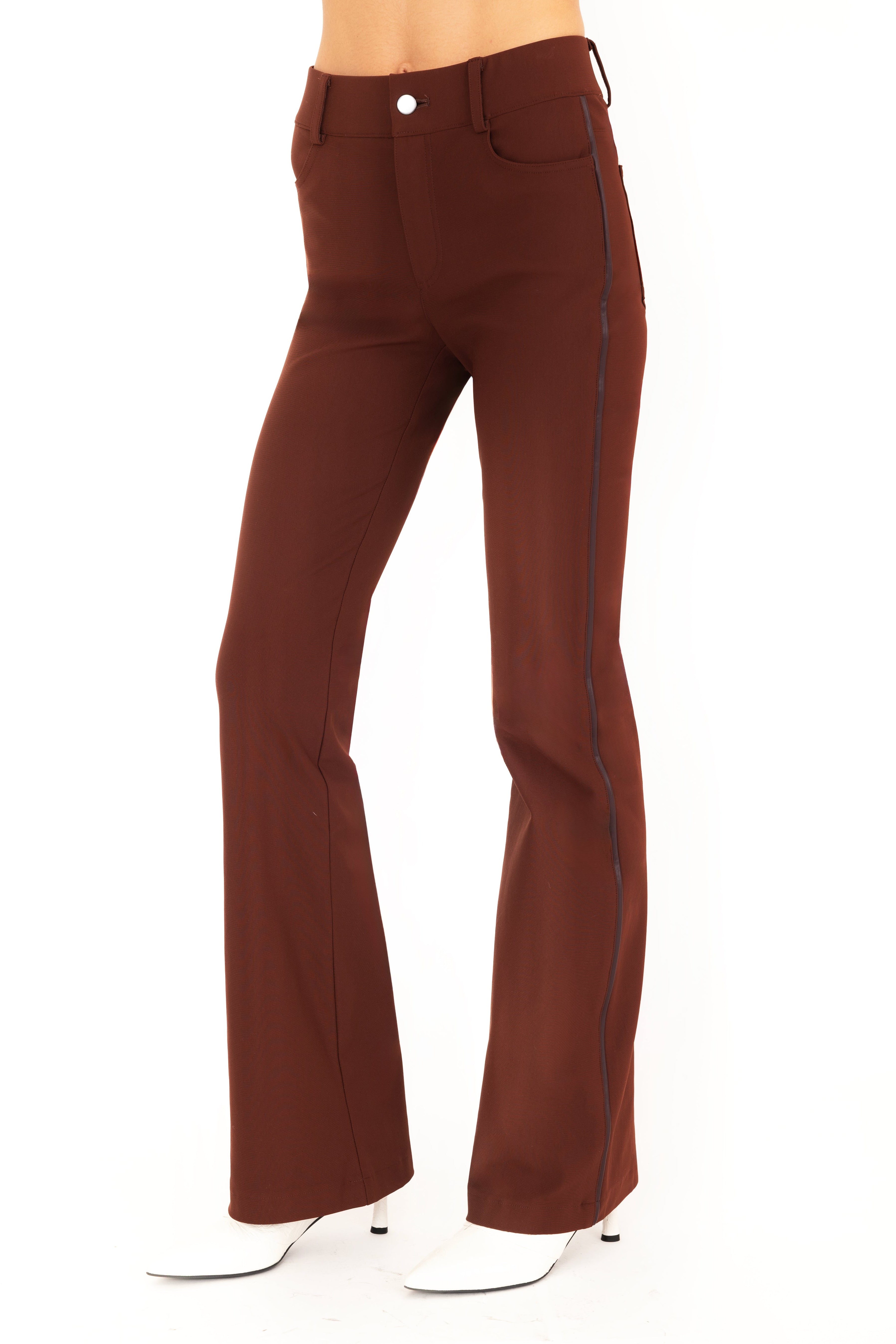 Brown flared pants on a white background