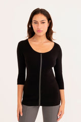 Woman wearing a black sweater white background