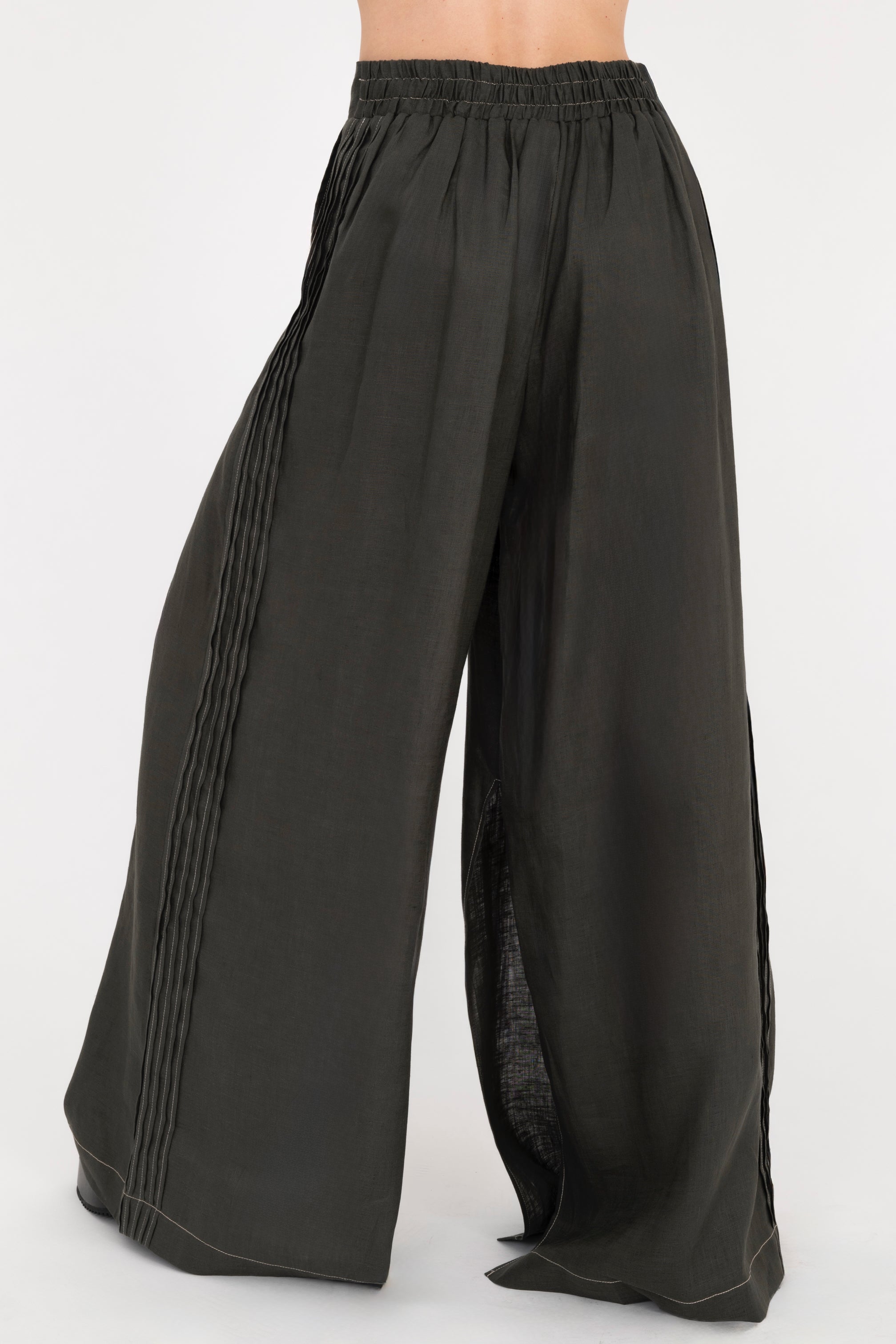 Pine green wide-leg pants on a white background