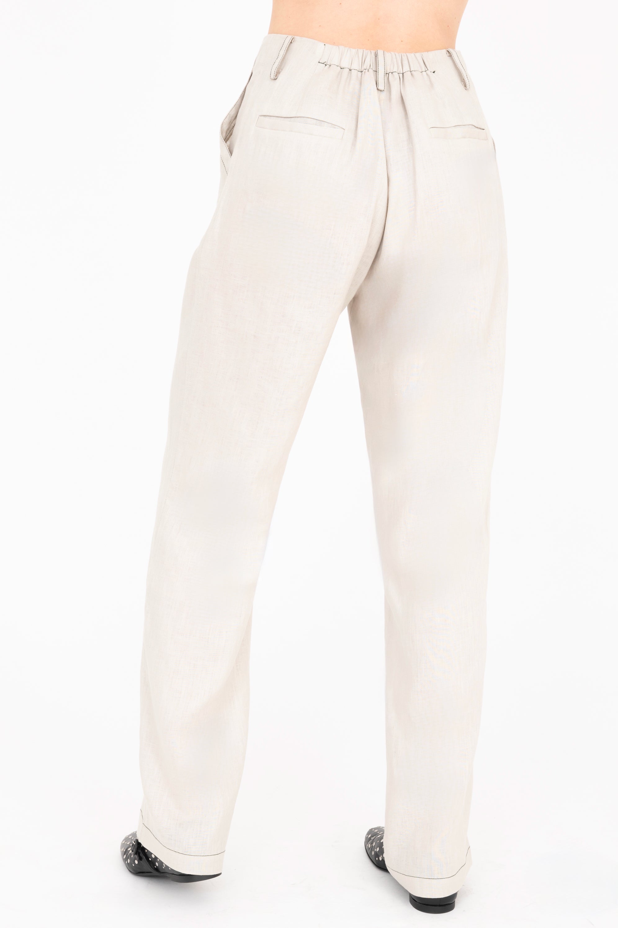 Beige pants on a white background