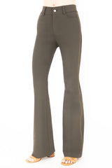 Green flared pants on a white background