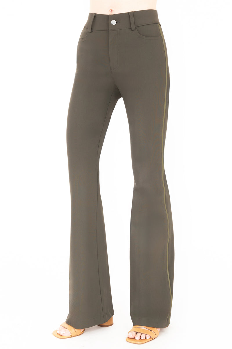 Green flared pants on a white background