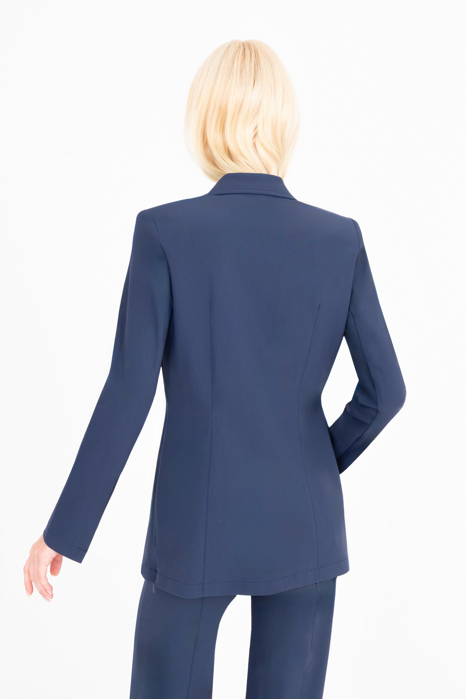 Woman wearing a blue suit on a white background