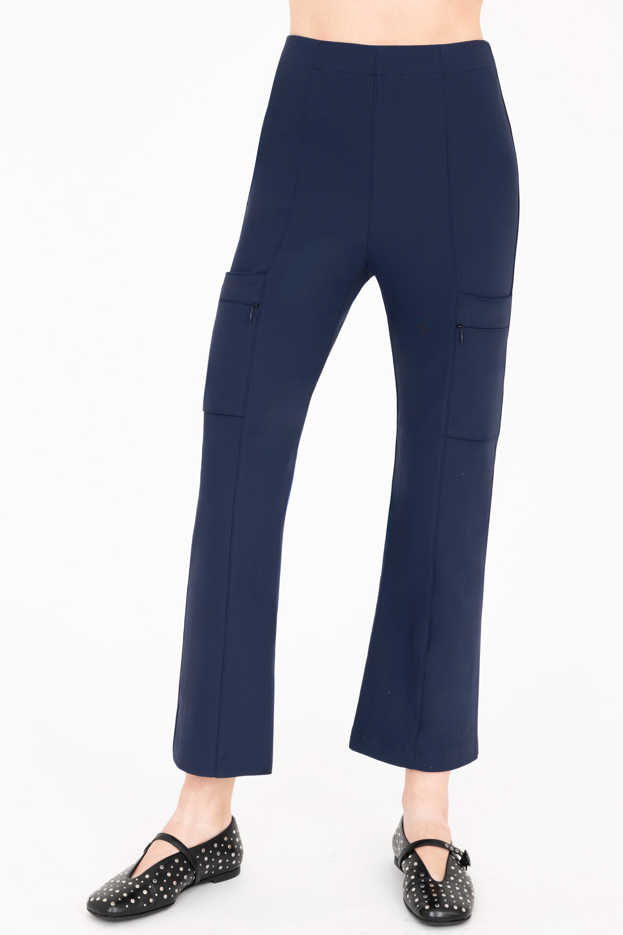 Front view of indigo blue cargo pants worn on a white background