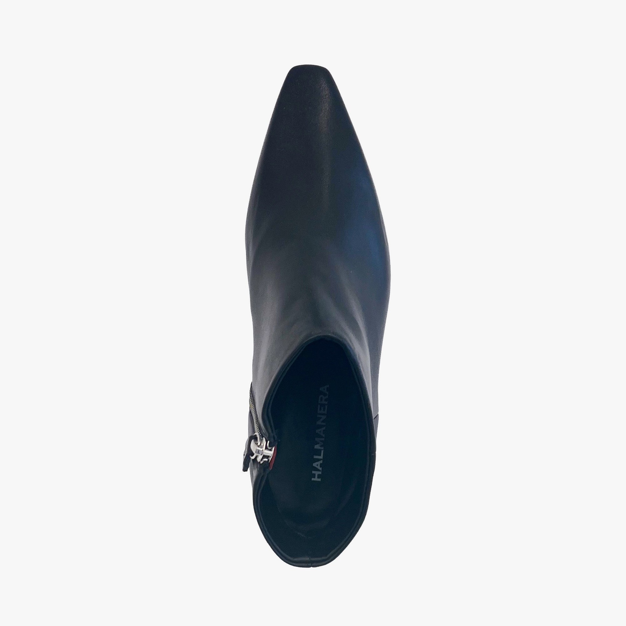 A black leather ankle boot with a pointed toe and a side zipper, shown from a top-down perspective on a light gray background. 