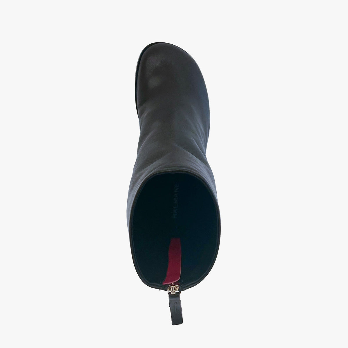A single dark brown leather ankle boot shown from a top-down view on a light gray background, featuring a gold-tone zipper pull and a dark interior with a red accent tab.