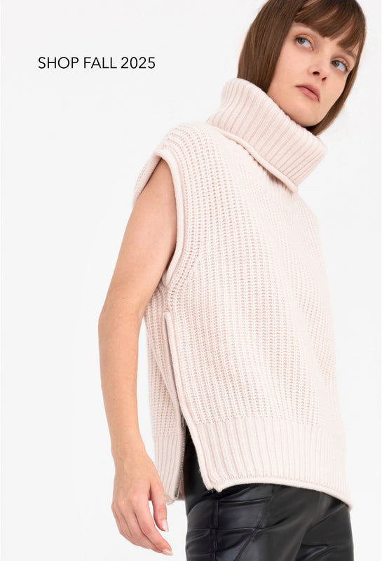 woman wearing cream turtleneck sweater with words "shop the fall collection" on a white background