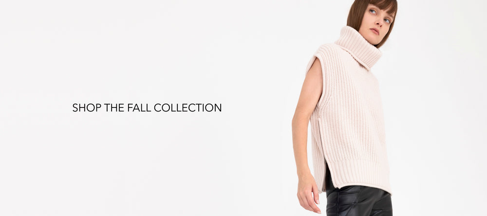 woman wearing cream turtleneck sweater with words "shop the fall collection" on a white background