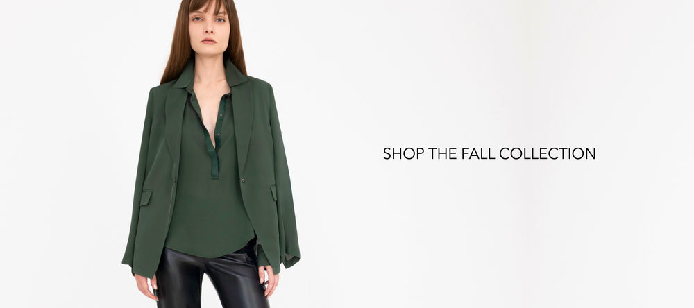 Woman wearing a green blouse with text 'Shop the Fall Collection' on a white background