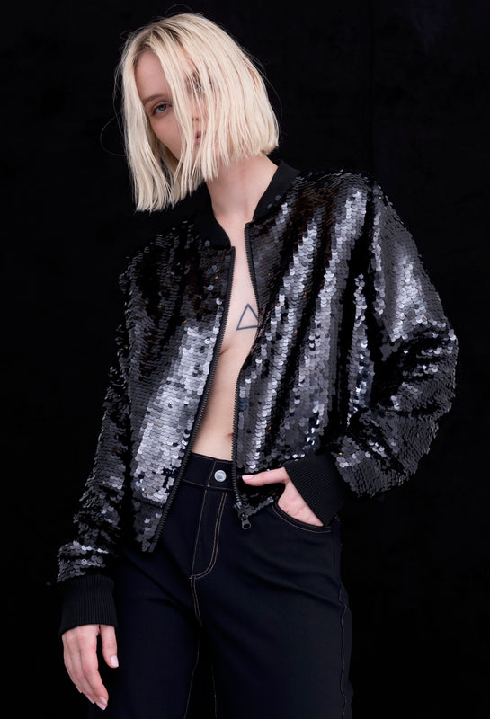 woman wearing sequin bomber jacket