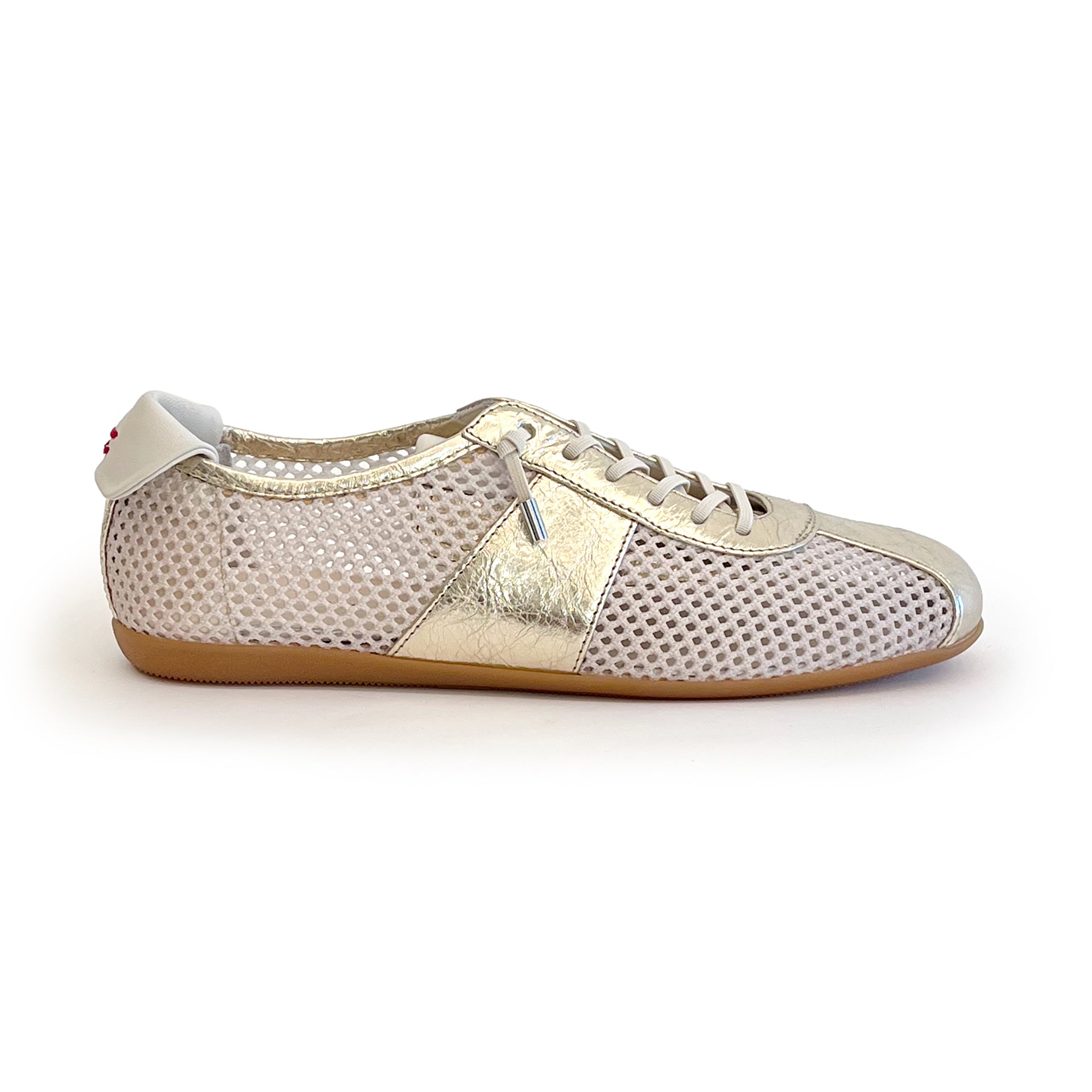 White mesh sneaker with metallic leather contrast on a white background