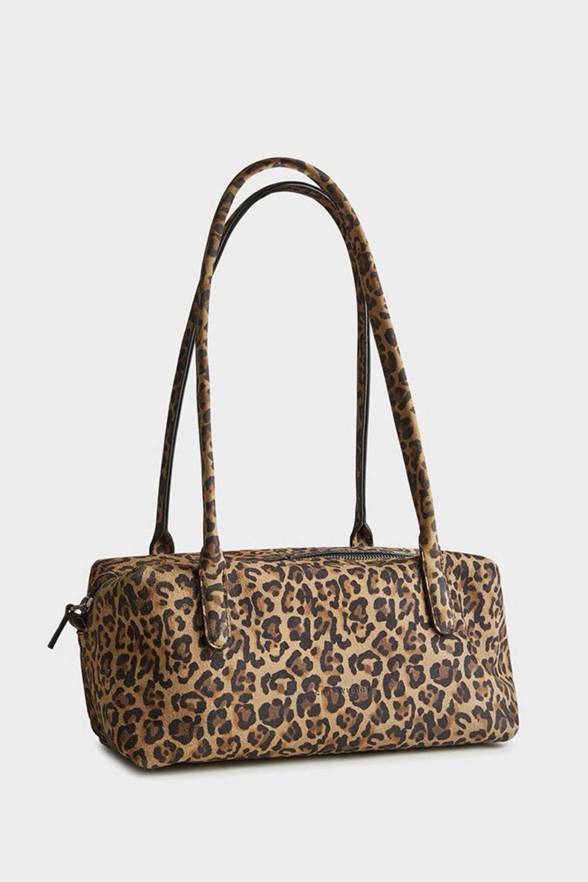 A leopard print suede bag with two shoulder straps, shown against a plain light gray background.