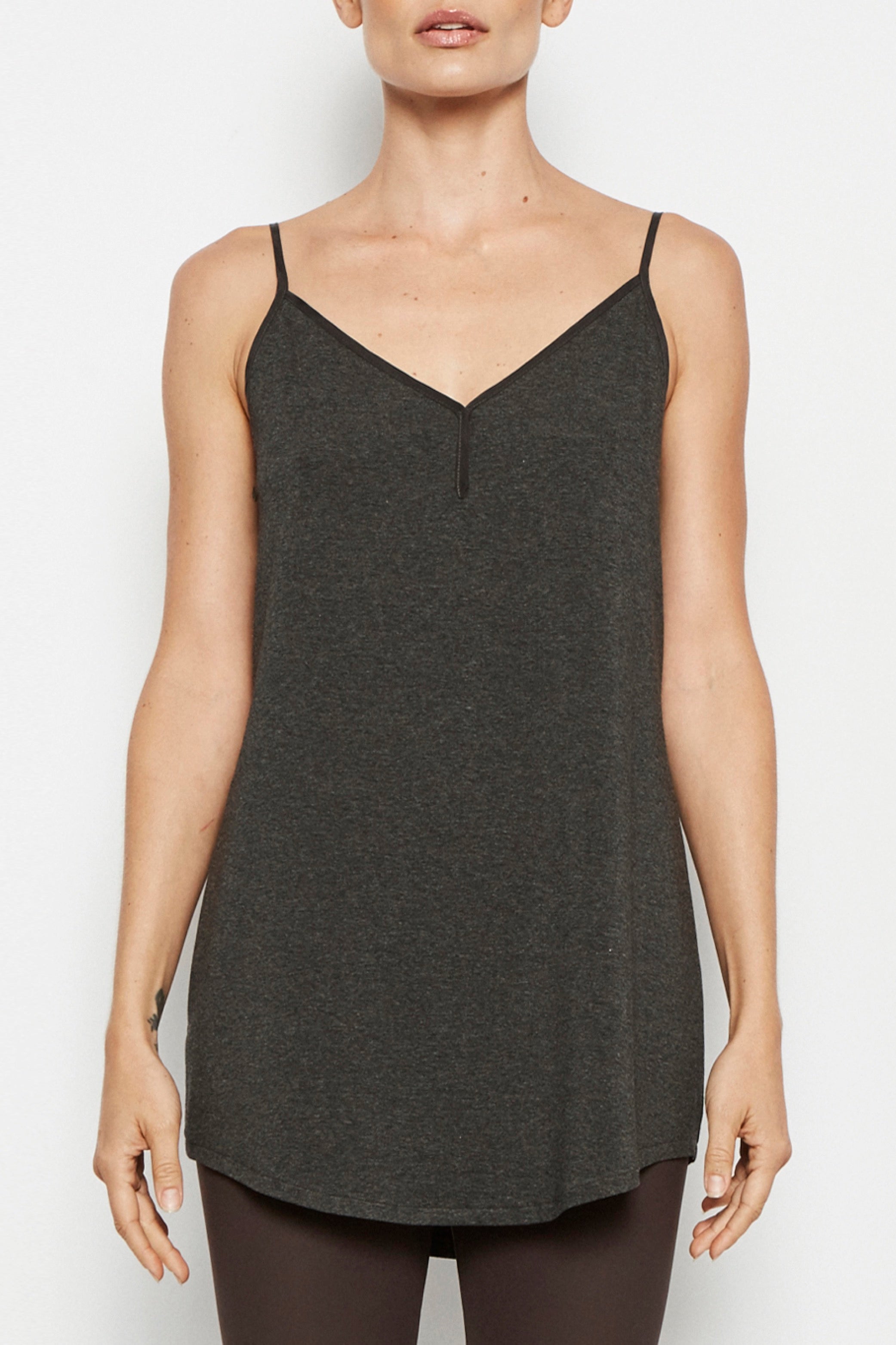 Dark gray camisole worn on a white background