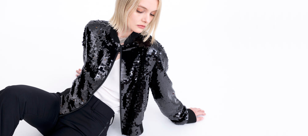 woman wearing sequin jacket