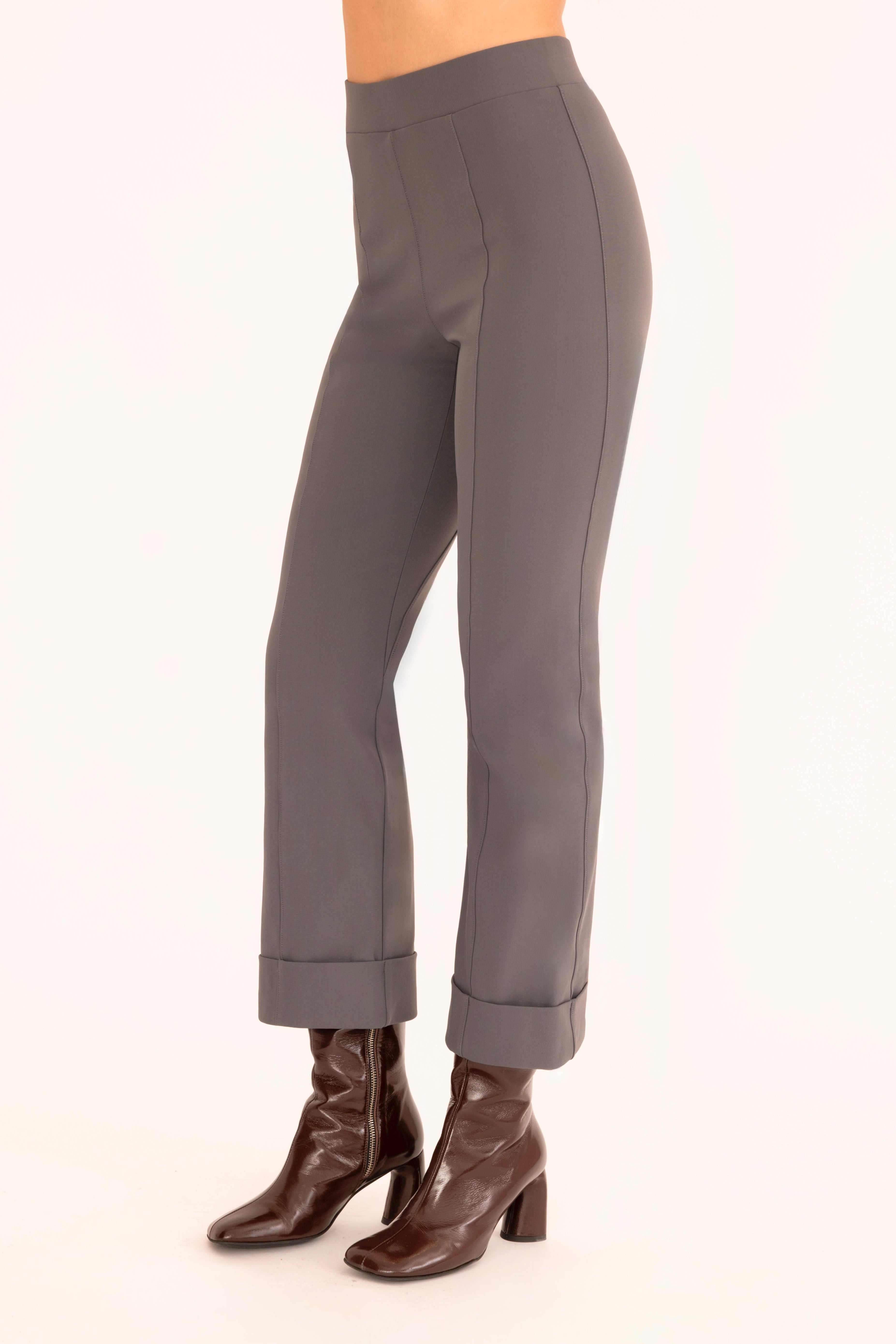 Side view of gray cropped cuff pants on a white background
