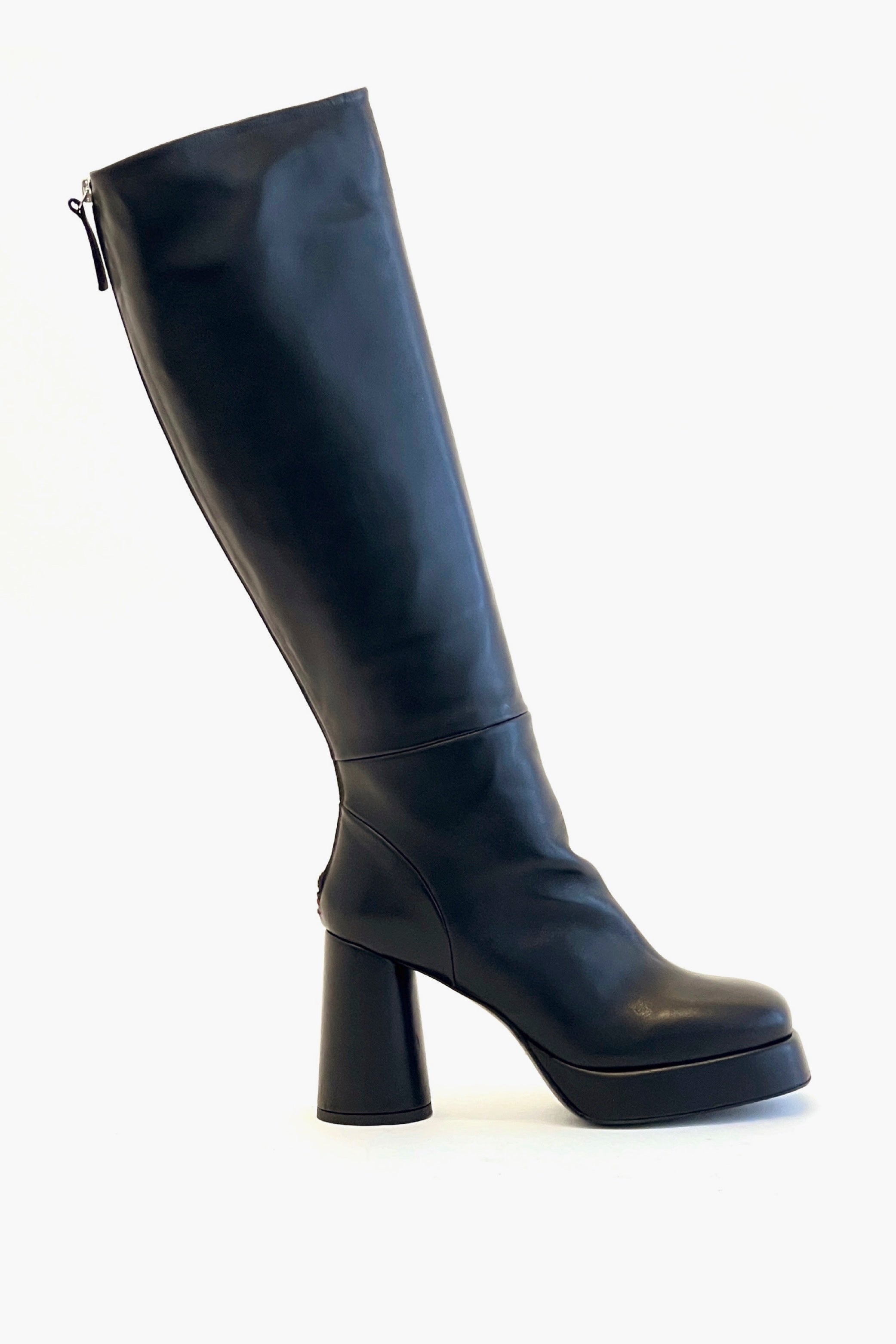 Black knee-high boot on a white background