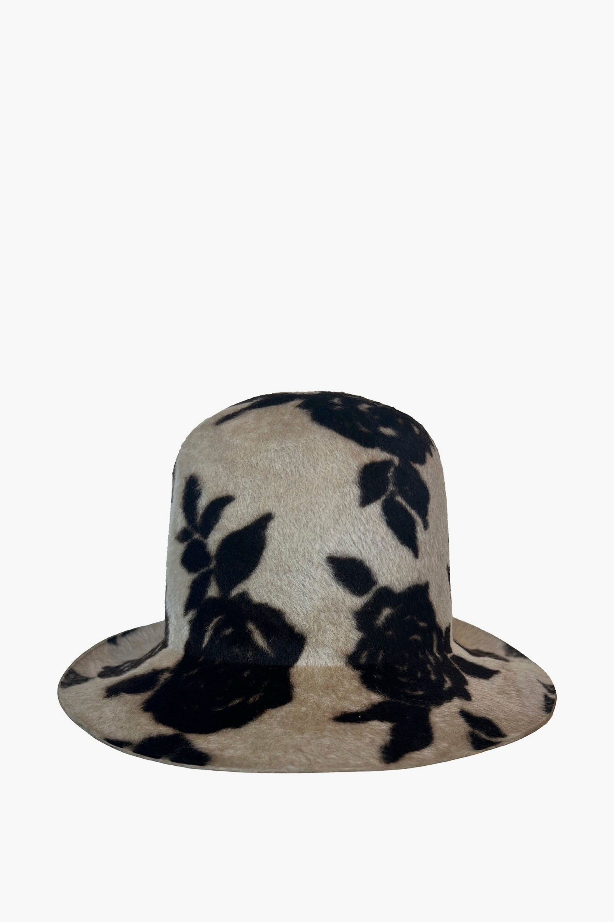 Derby hat with black floral pattern on a white background