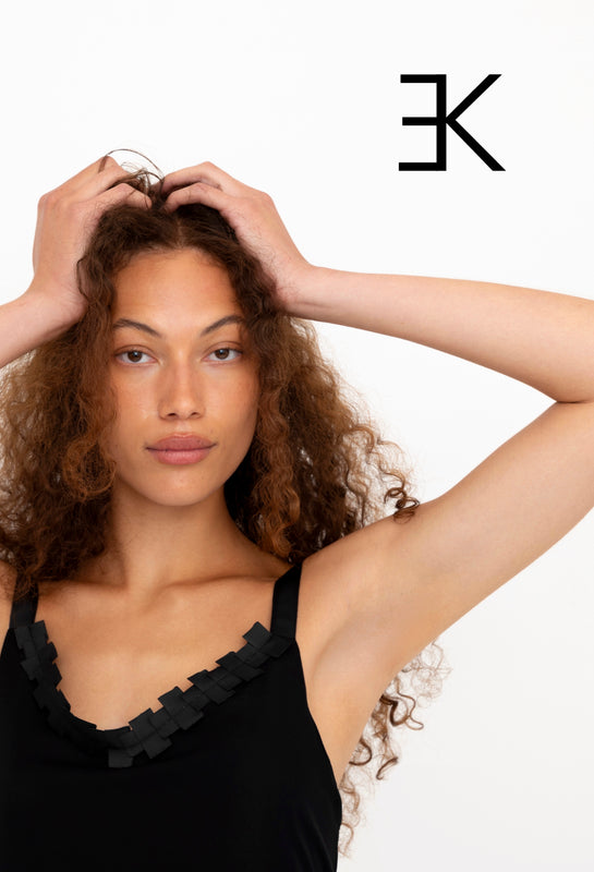 woman wearing black silk top