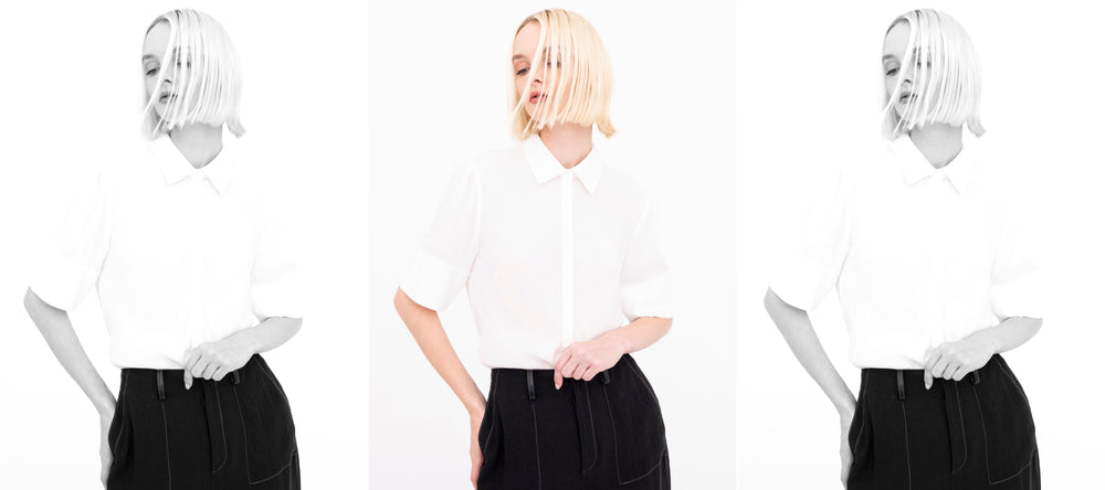 woman wearing white silk shirt and and black linen pants