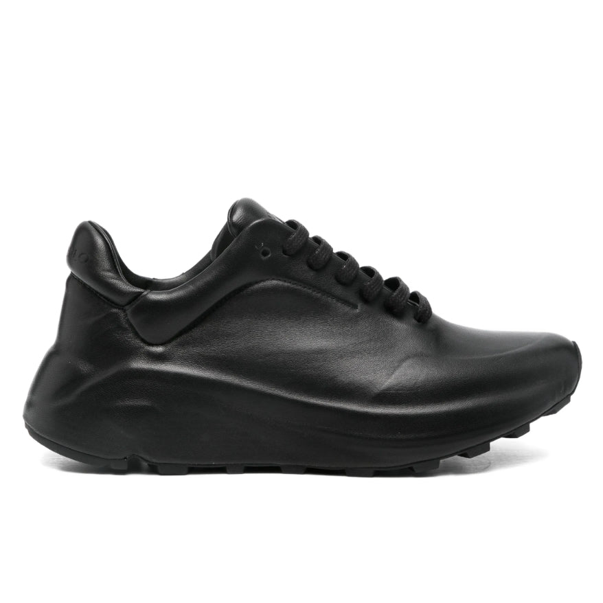 Black leather sneaker on a white background