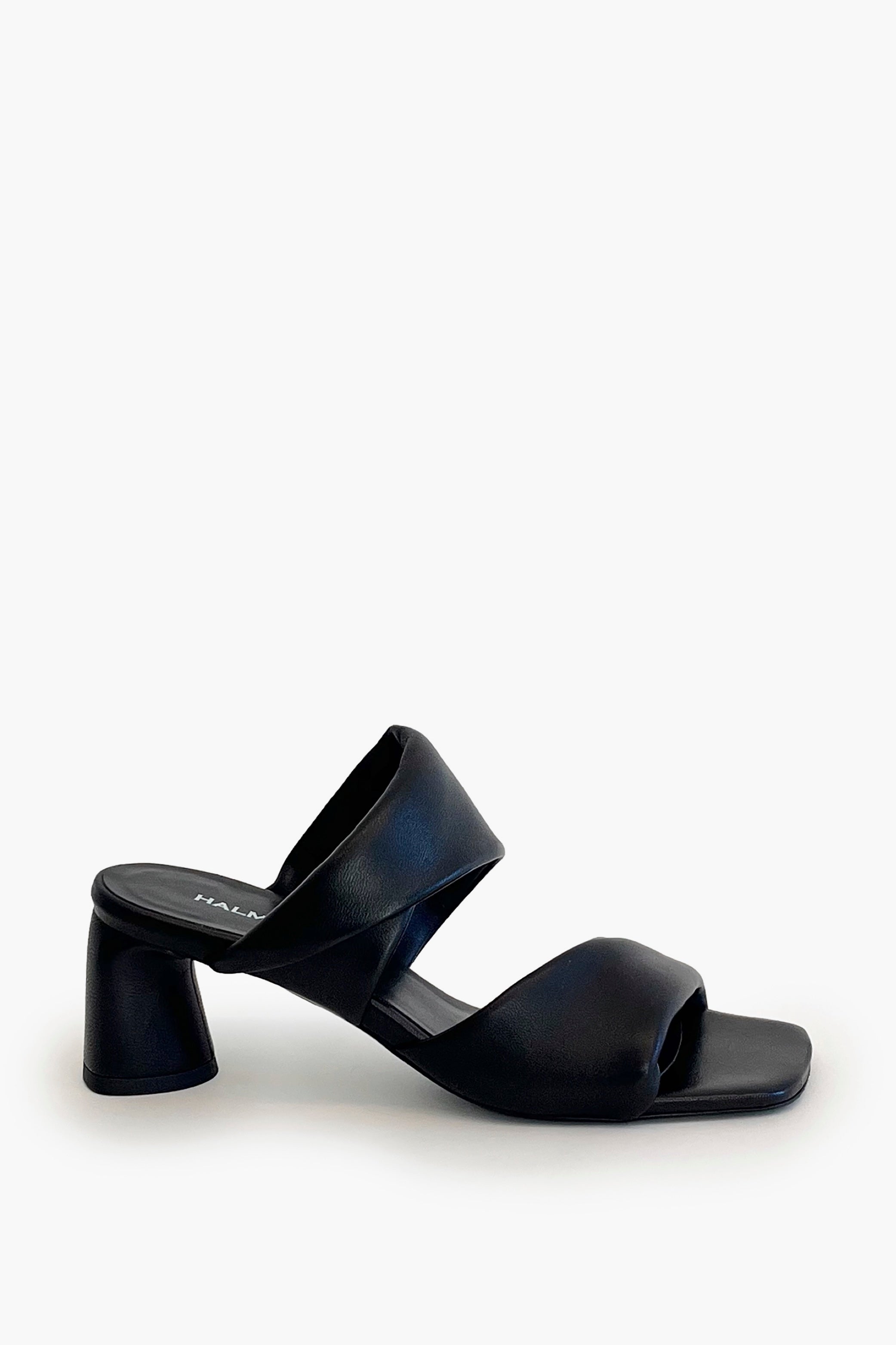 Black sculptured chunky heel sandal on a white background