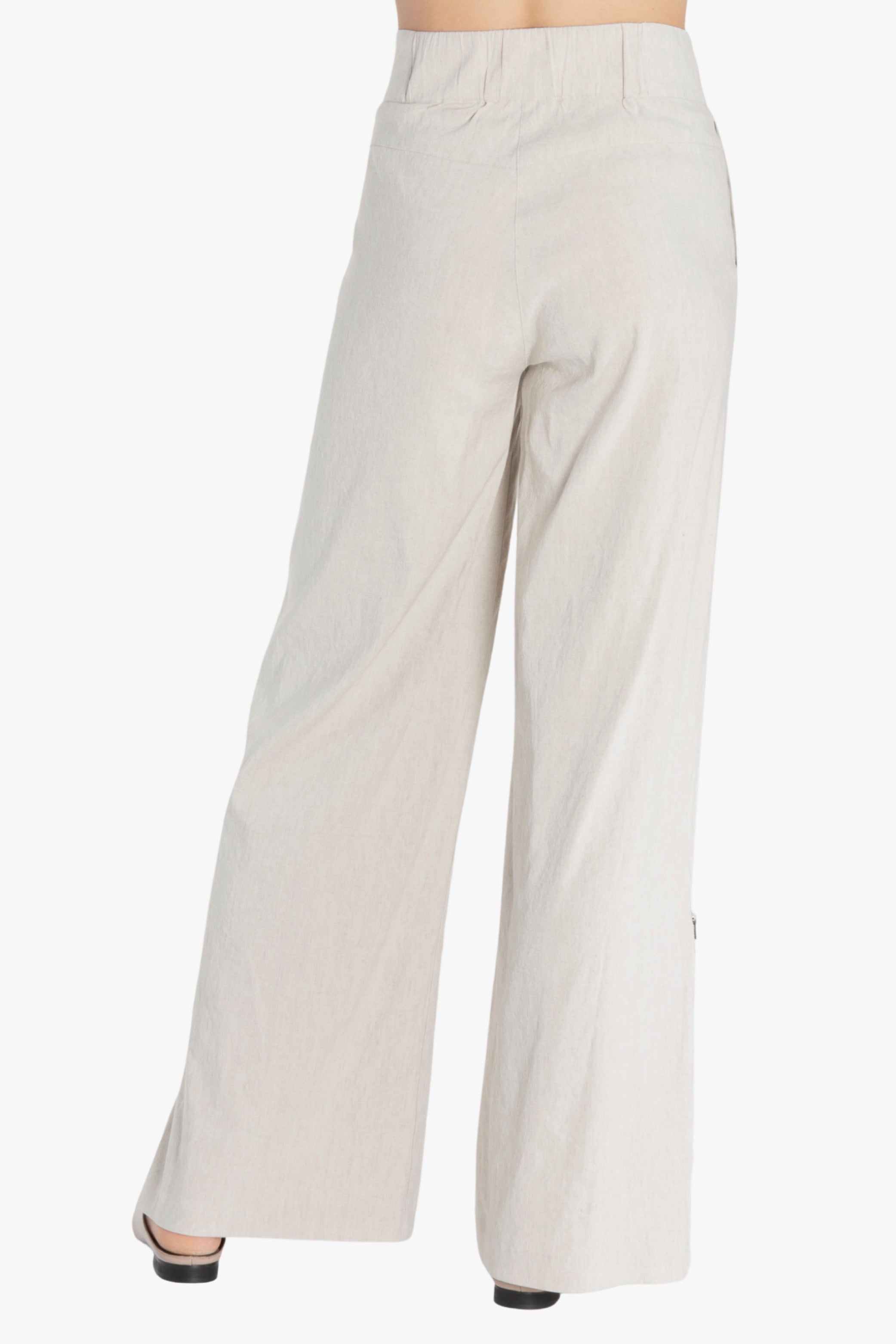 Beige wide-leg pants on a white background